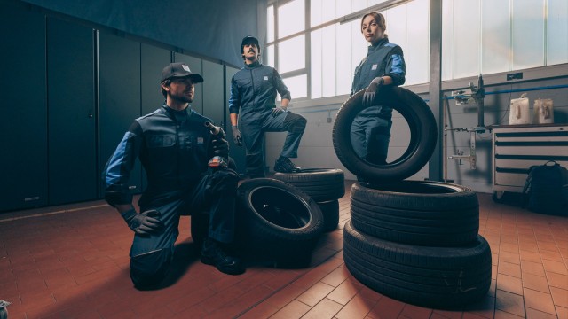 mechanic and customer in workshop